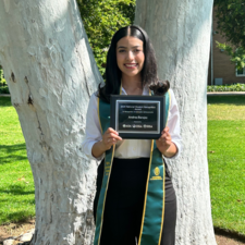 Andrea Barajas with Award